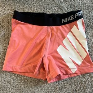 Nike Pro pink medium rise running shorts size large